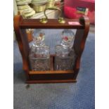 An oak cased two-decanter Tantalus