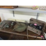 A mixed lot to include a vintage portable telephone, a pulley and a pair of twin branch candle