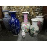 Oriental ceramics to include a large Imari style vase, a famille rose style vase and four other