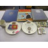 Two Coronation plates, an Edward VIII mug, Royalty related books, a quantity of Craven Black Cat