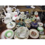 Mixed early 20th century tea saucers and ornaments and mixed tea cups