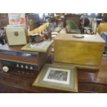 A mixed lot to include a manual sewing machine, a record player, records, prints and other items