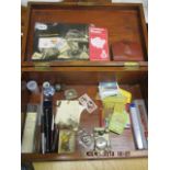 A Victorian Stained pine box and contents to include pens, 1960's & 1970's bus tickets, stamps, a
