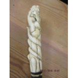 An early 20th century walking stick with carved ivory handle in the form of an elephant and