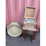 A mixed lot to include a nest of tables, records, a gramophone, rugs, brass trays and other items