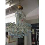 A French late 19th century chandelier with blue beaded and glass decoration with crystal drops