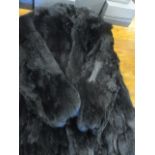 A vintage rabbit fur hip length jacket dyed black, 27" long x 38" chest approximately