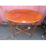 An Edwardian mahogany oval topped occasional table 29"h x 29"w