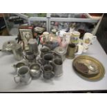 A mixed lot to include commemorative mugs, pewter mugs, a clock and a silver plated cruet set