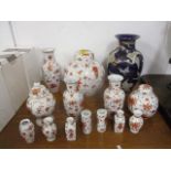 Oriental style ceramics to include a vase decorated with cranes and matching vases, ginger jars