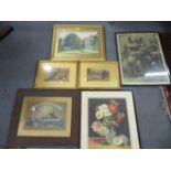 A pair of early 20th century unsigned watercolours depicting cottages, mounted in gilt frames,