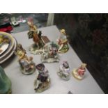 A selection of seven figures to include a Sitzendorf 19th century figure, Naples and others, mixed