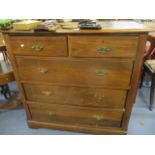 An early 20th century mahogany chest of two short and three long drawers on bracket feet