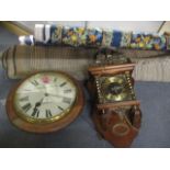 A wall hanging clock together with a whytock and dial clock