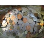 A quantity of British, Irish and various other country coins to include pre-1947 Florins, two-