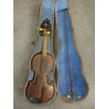 A 18th/19th century violin with ivory and ebonized pegs, a two-piece back and bow with two wooden