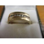 A 9ct gold and diamond ring 5g