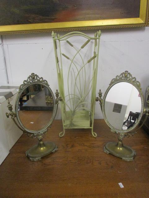 A pair of modern brass swing pedestal mirrors and a cream painted metal stick stand