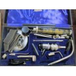 Vintage doctors' instruments contained in a box by Theodore Hamblin Ltd London