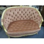 A painted French style salon sofa with pink velour upholstery