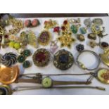 A quantity of costume jewellery to include bead necklaces, vintage clip-on earrings and two