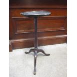 A George III oak pedestal wine table, on a tripod base 24"h x 12" dia.