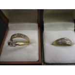 Three 9ct gold and diamond rings