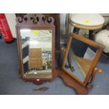 A Victorian mahogany dressing table mirror and a mahogany wall mirror A/F