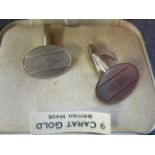 A pair of 9ct gold cuff links with machine turned decoration, boxed, weight 7.25g