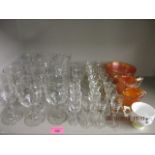 A quantity of wine and sherry glasses together with 2 carnival glass jugs and bowl