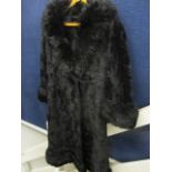 A vintage black faux fur ladies' coat