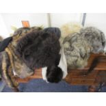 A selection of vintage hats to include a gents wolf fur hat and a small fox stole