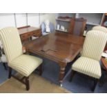 A modern Victorian design mahogany extending dining table with two additional leaves, together