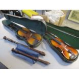 Two violins cased, together with two accordions, treadle and alto