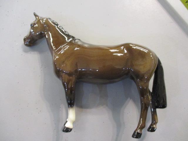 Three Beswick models of dogs to include a Labrador together with a Beswick model of a horse - Image 2 of 2