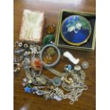 Mixed costume jewellery to include a Scottish brooch, a compact and other items