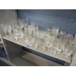 A selection of good quality cut glassware to include Champagne flutes