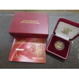 A 2003 UK gold proof half sovereign, no 02590, cased with certificate of authenticity