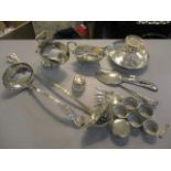 Mixed silver and silver plate to include a silver plated serving ladle, silver napkin rings and