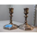 A pair of cast silver candlesticks hallmarked London 1967, 4 1/2"h