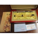 A boxed modern Chinese gilt pen with original certificates