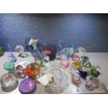 A selection of glass paperweights and ornaments to include a Whitefriars paperweight and a