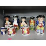 A quantity of late 19th/early 20th century character jugs, (8)