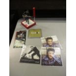 Elvis Collectibles to include a figure, a CD and letters