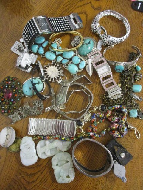 A mixed lot of mainly costume jewellery to include turquoise inset bangles, a Venetian beaded