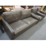 A two seater leather sofa and two armchairs