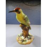 A Royal Crown Derby green woodpecker, 9" h