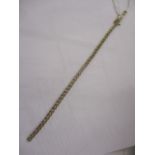 A 9ct gold diamond inset bracelet