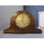 An Edwardian mahogany mantle clock having a silvered dial with Roman numerals, 5 1/2"h x 9"w