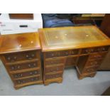 A reproduction yew desk 30" h x 36"w and a matching chest 31" h x 17"w